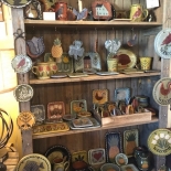 clay dishes on shelves